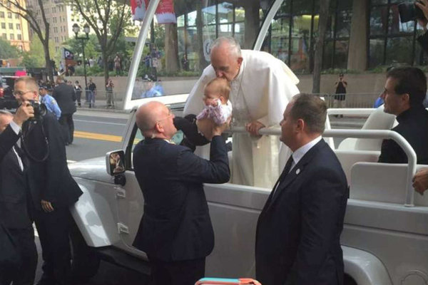 Brain tumor of baby kissed by Pope Francis is shrinking